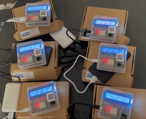 Looping video of six CO2 monitors with blinking blue lights, automatically posting data to a google spreadsheet